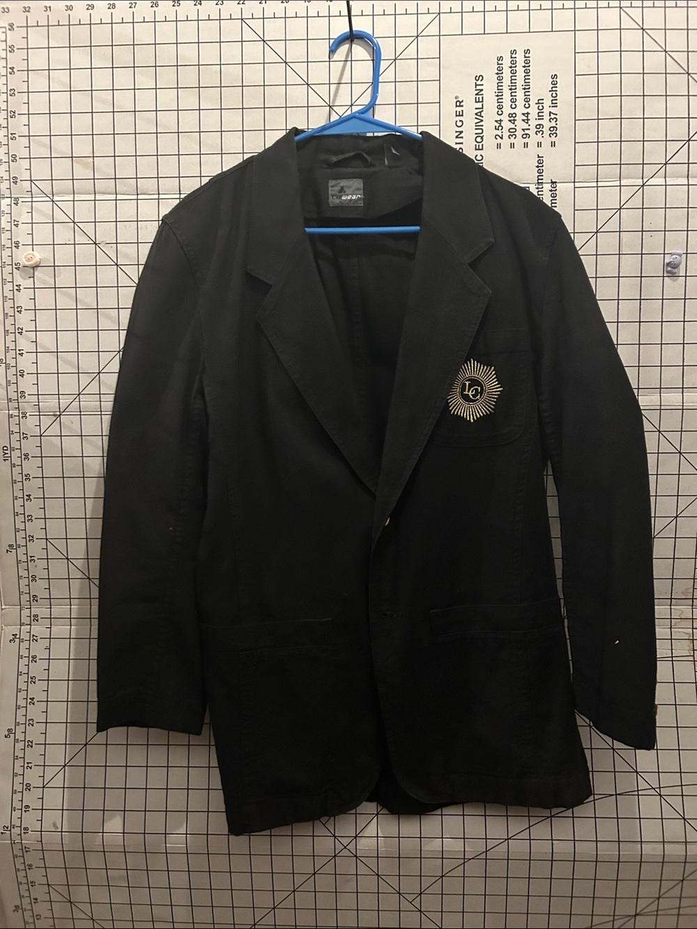 Lizwear Black Blazer with Gold Sunburst Patch